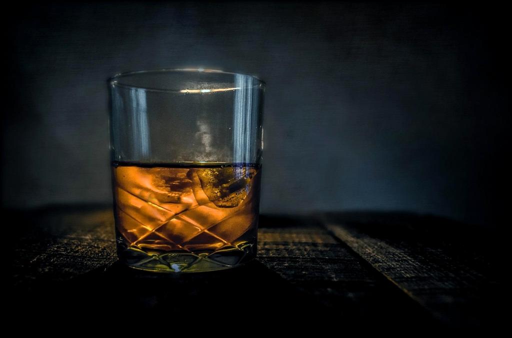 Modern industrial nightclub interior with dramatic lighting and concrete architecture