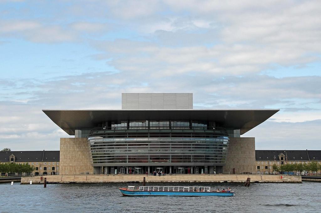 Opulent Paris Opera House with golden details and crystal chandeliers